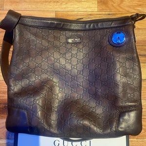 Stunning rare chocolate Guccismia messenger fits ipad pro 12inch. Unisex